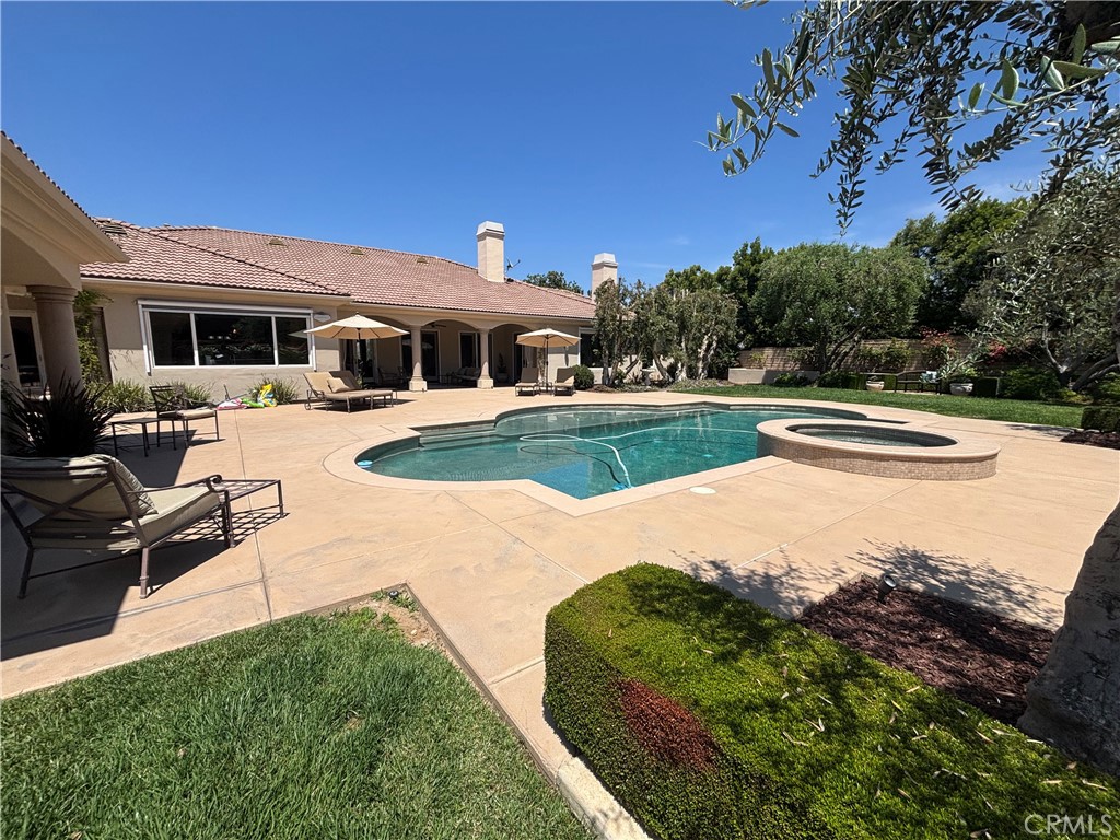 1662 Cherokee Road Corona, CA 92881 - Photo 13 of 60 a view of a house with a yard