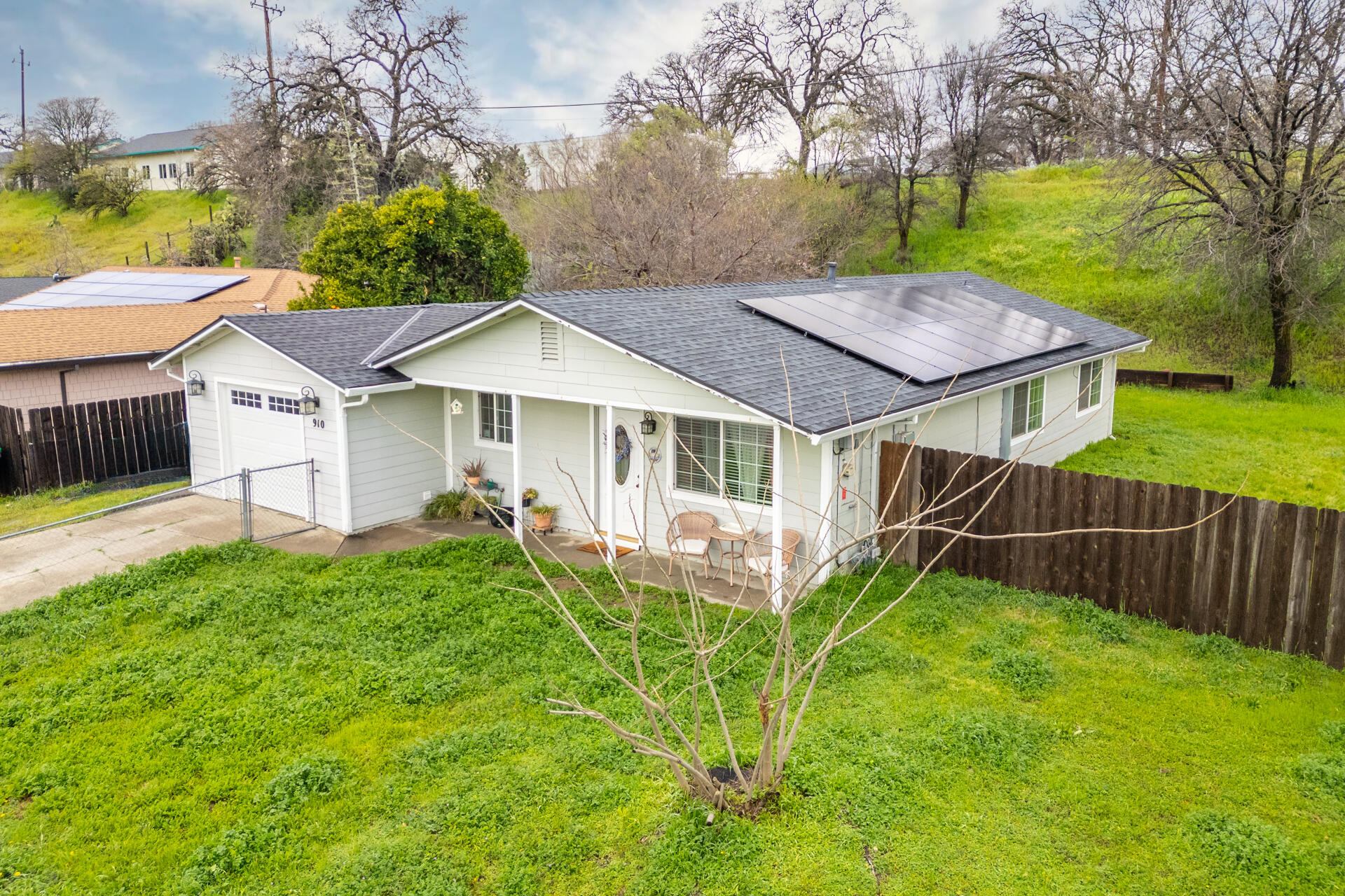 910 Aloha Street Red Bluff, CA 96080 - Photo 24 of 26 a view of a house with a yard and sitting area