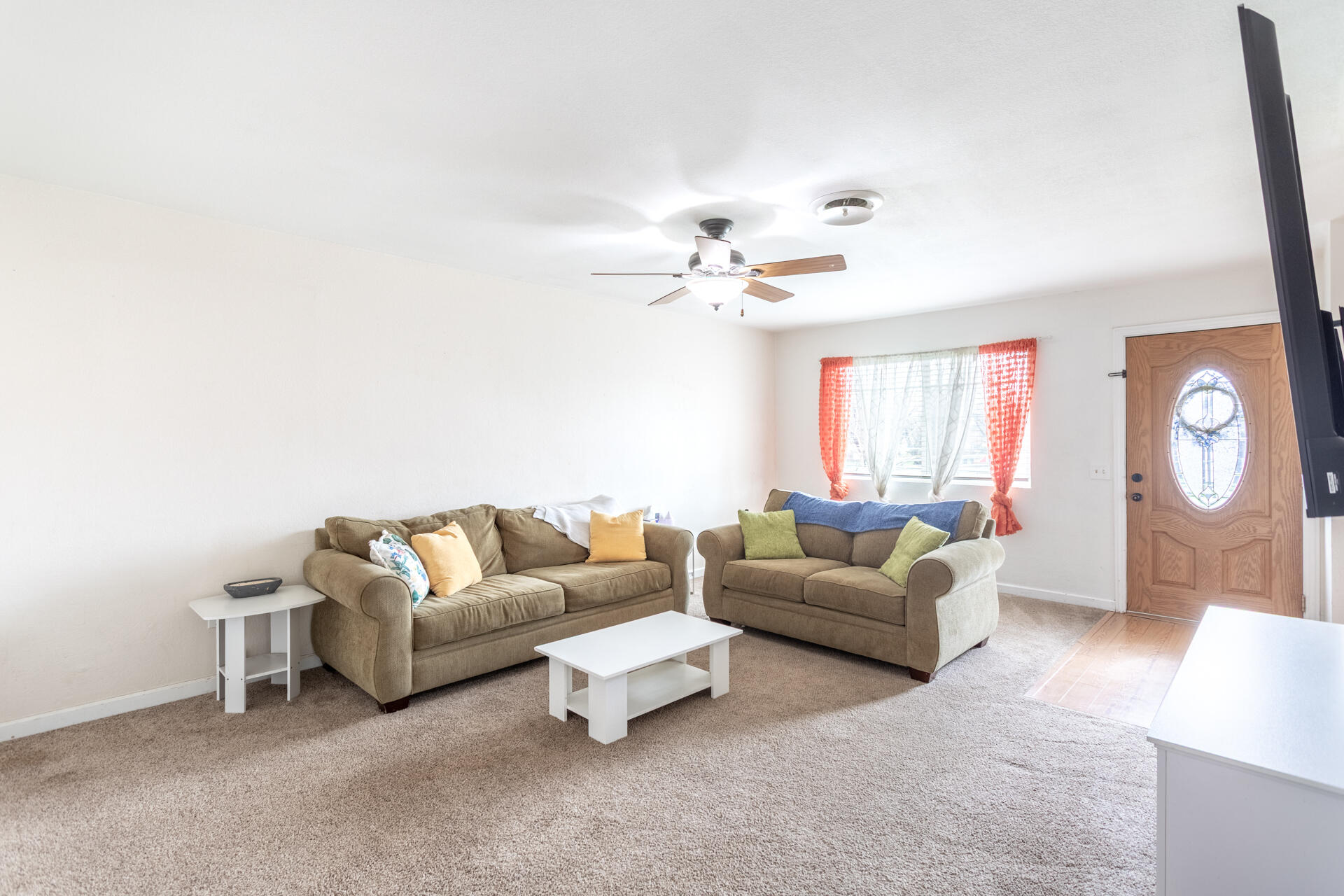910 Aloha Street Red Bluff, CA 96080 - Photo 4 of 26 a living room with furniture and a large window