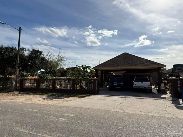 a car parked in front of a house