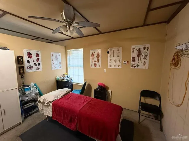 a view of a hallway with a door
