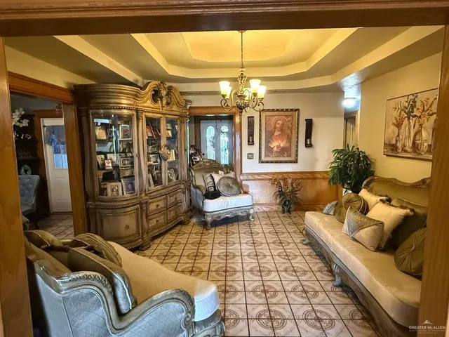 a room with furniture and white walls