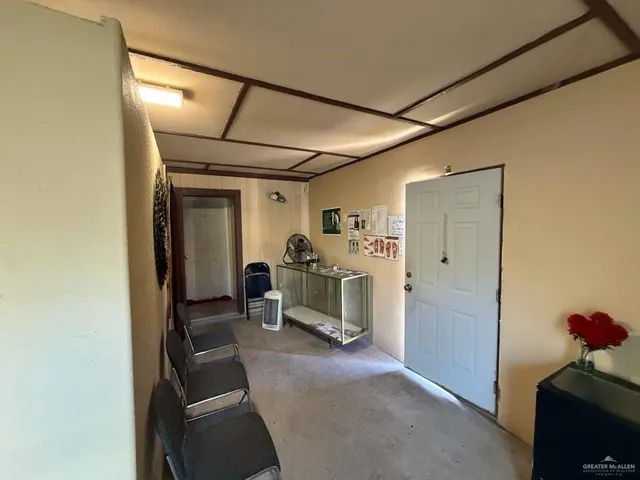 a view of a room with windows