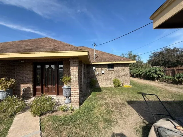 a view of a house with a patio