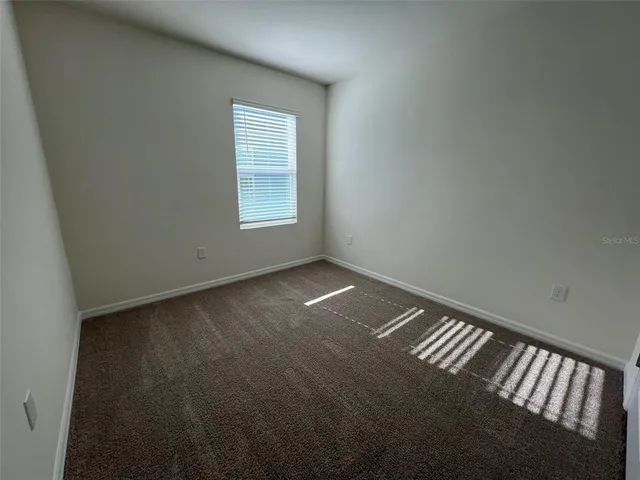 a view of room with walk in closet