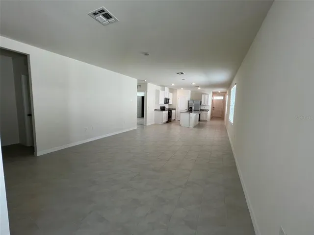 a view of a kitchen and a sink