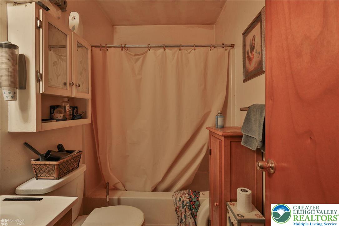 802 West Berwick Street Easton, PA 18042 - Photo 44 of 54 a bathroom with a shower curtain