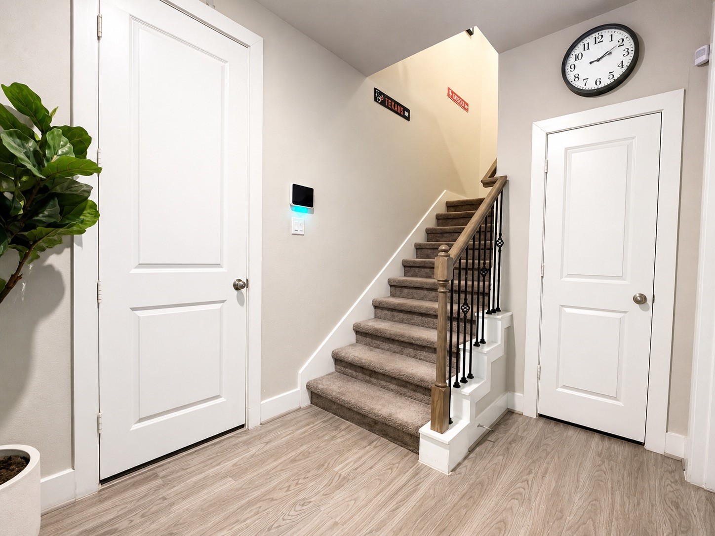 731 Janisch Road Houston, TX 77018 - Photo 4 of 19 foyer with angle of stairs, garage door access and coat closet!