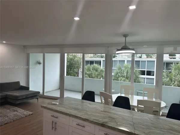 a view of a living room and furniture