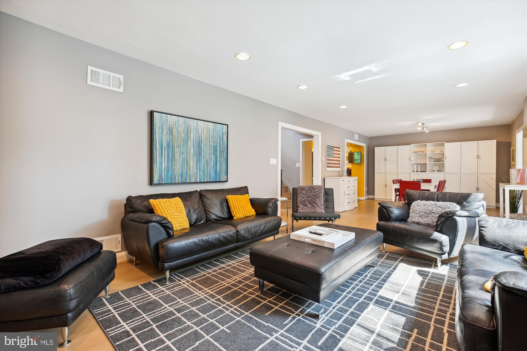 7304 Radnor Road Bethesda, MD 20817 - Photo 12 of 55 a living room with furniture and a rug