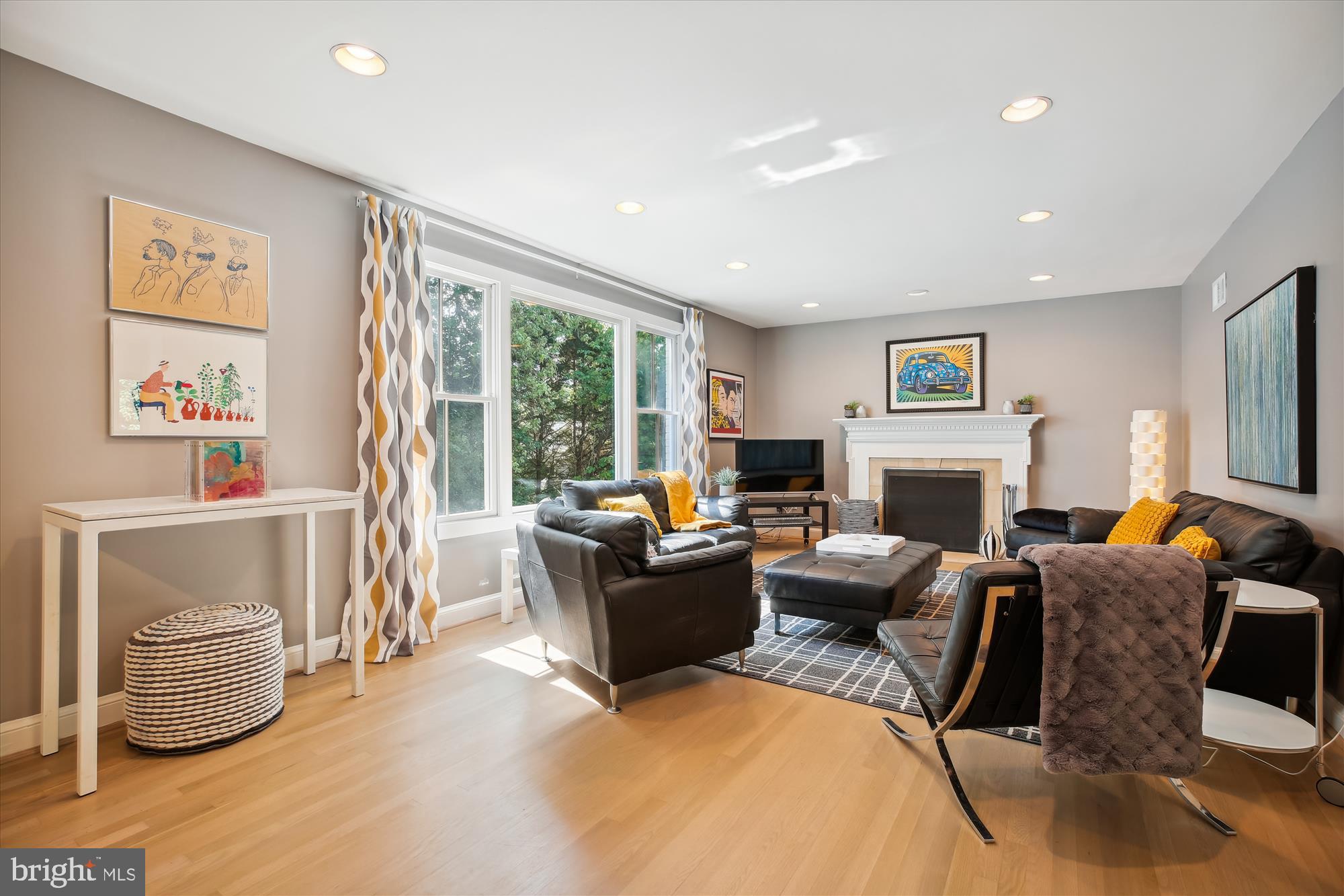 7304 Radnor Road Bethesda, MD 20817 - Photo 13 of 55 a living room with furniture fireplace and a large window