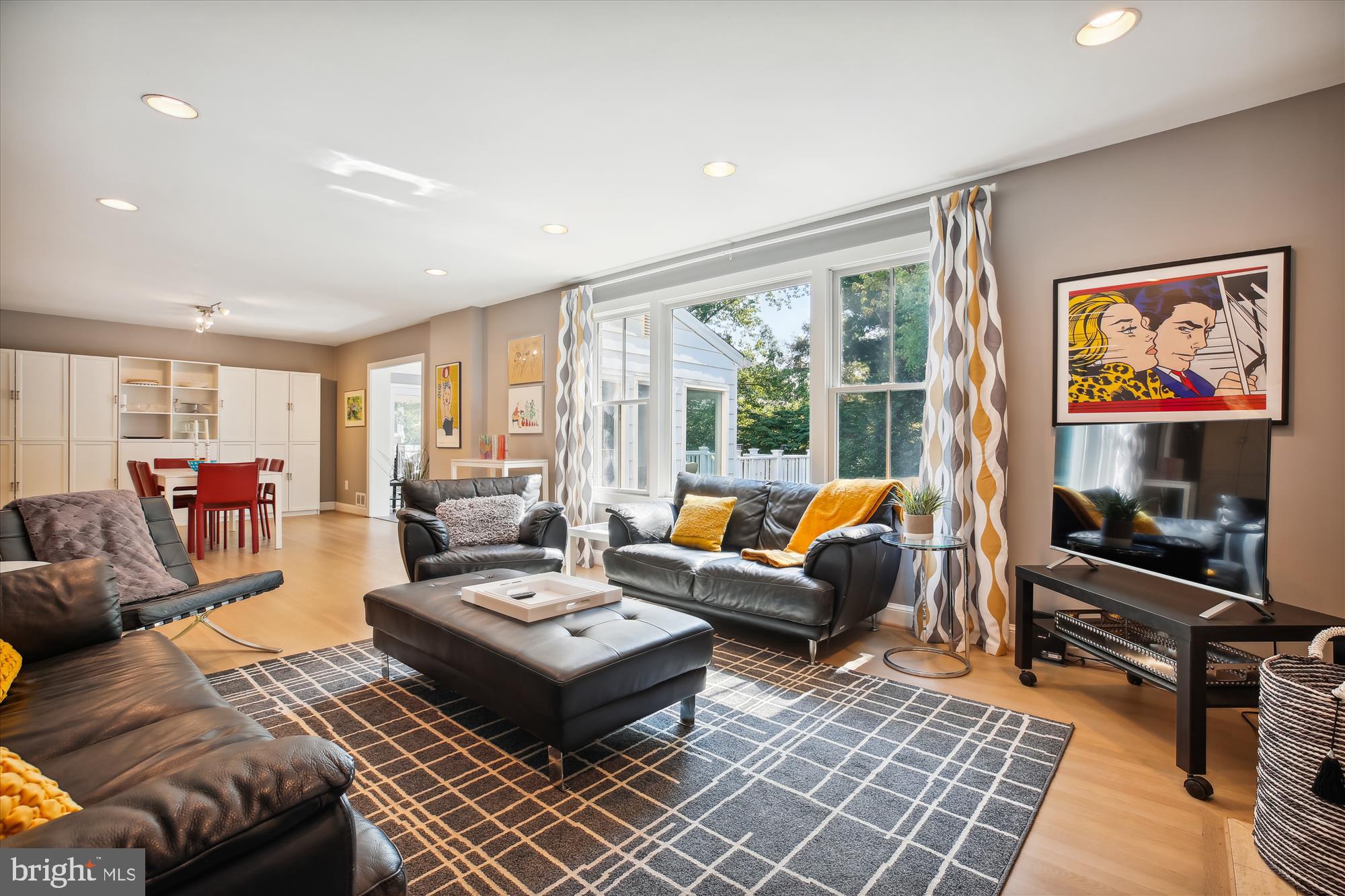7304 Radnor Road Bethesda, MD 20817 - Photo 14 of 55 a living room with furniture and a flat screen tv