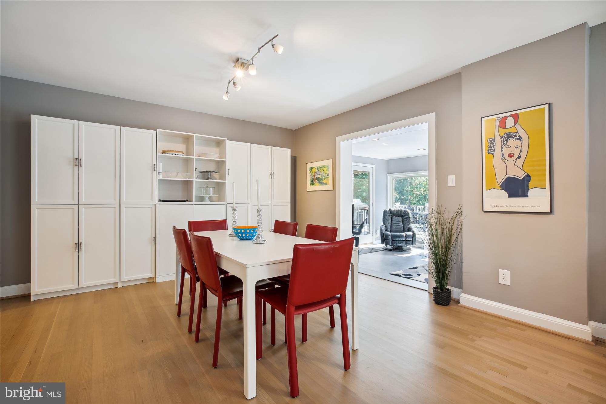 7304 Radnor Road Bethesda, MD 20817 - Photo 15 of 55 a view of a dining room with furniture and wooden floor