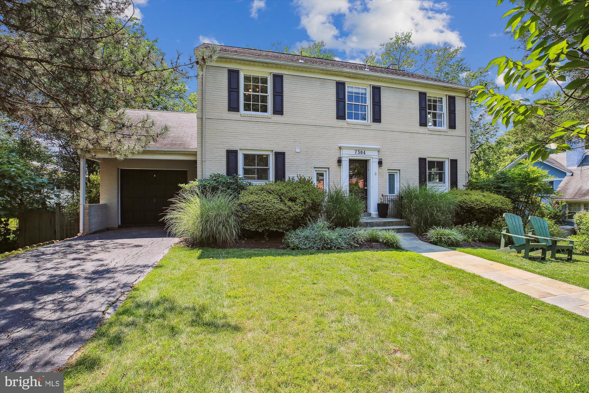 7304 Radnor Road Bethesda, MD 20817 - Photo 2 of 55 a front view of house with yard and green space