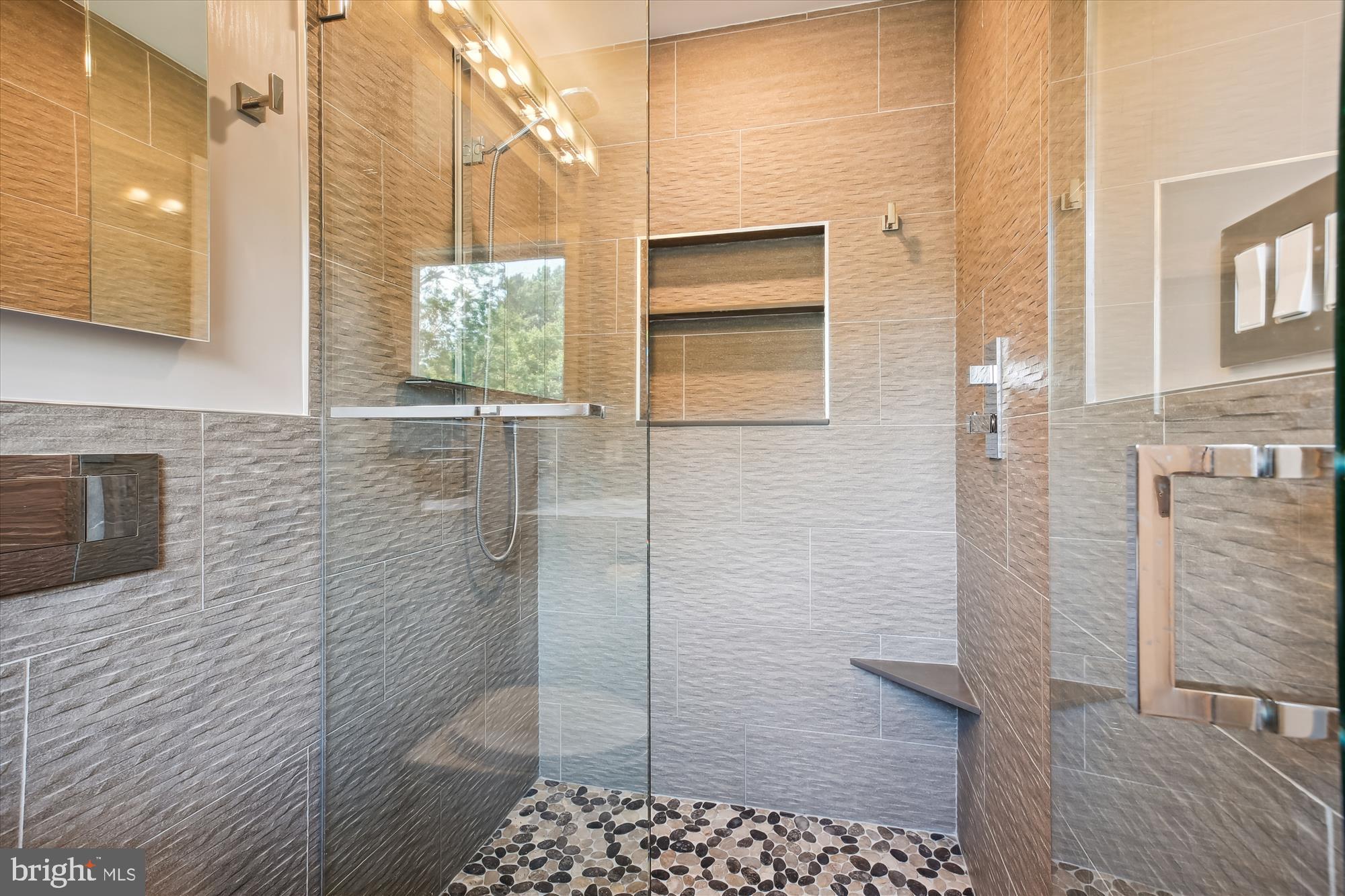 7304 Radnor Road Bethesda, MD 20817 - Photo 31 of 55 a bathroom with a shower