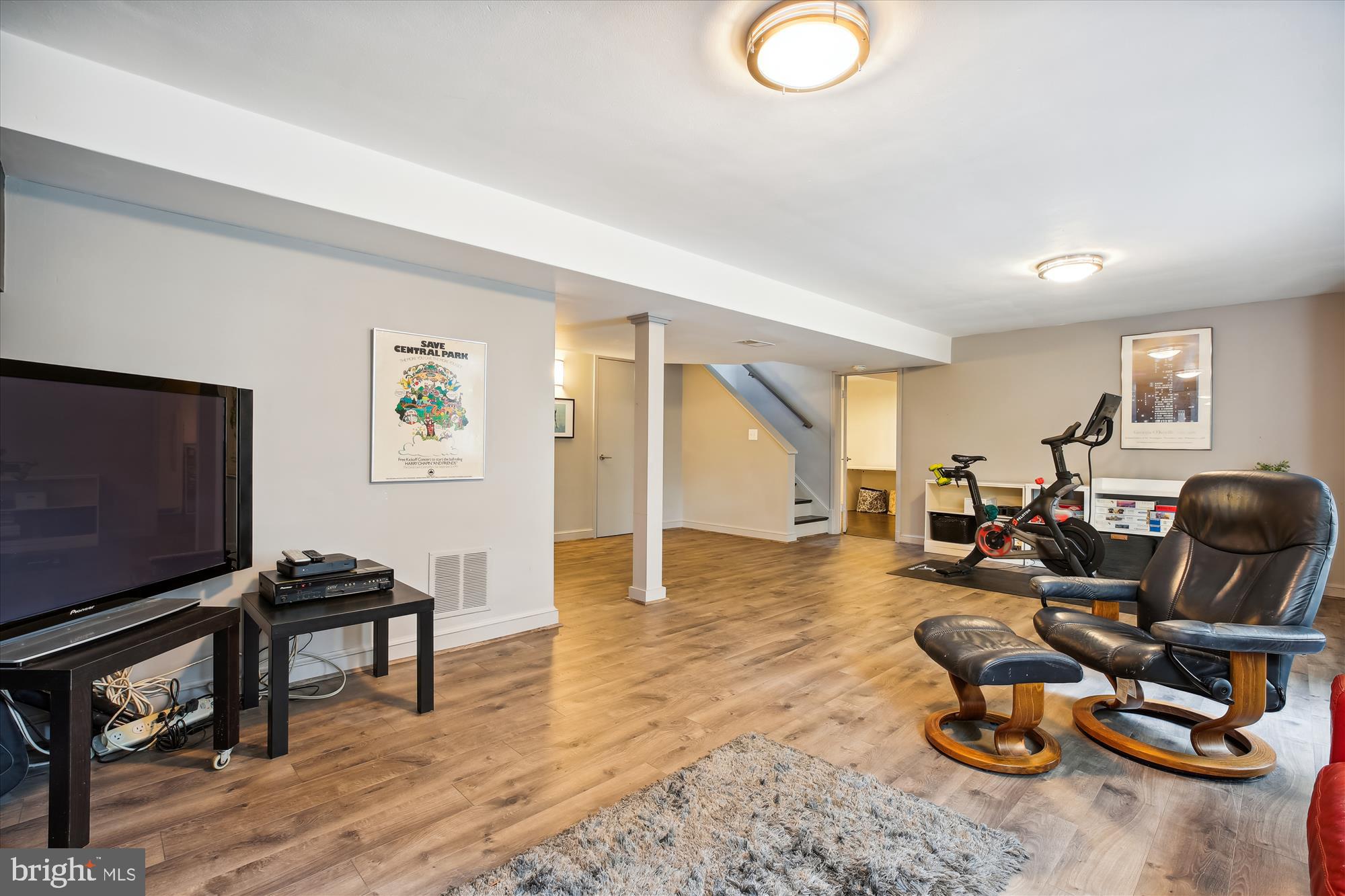 7304 Radnor Road Bethesda, MD 20817 - Photo 41 of 55 a view of a livingroom with furniture and a flat screen tv