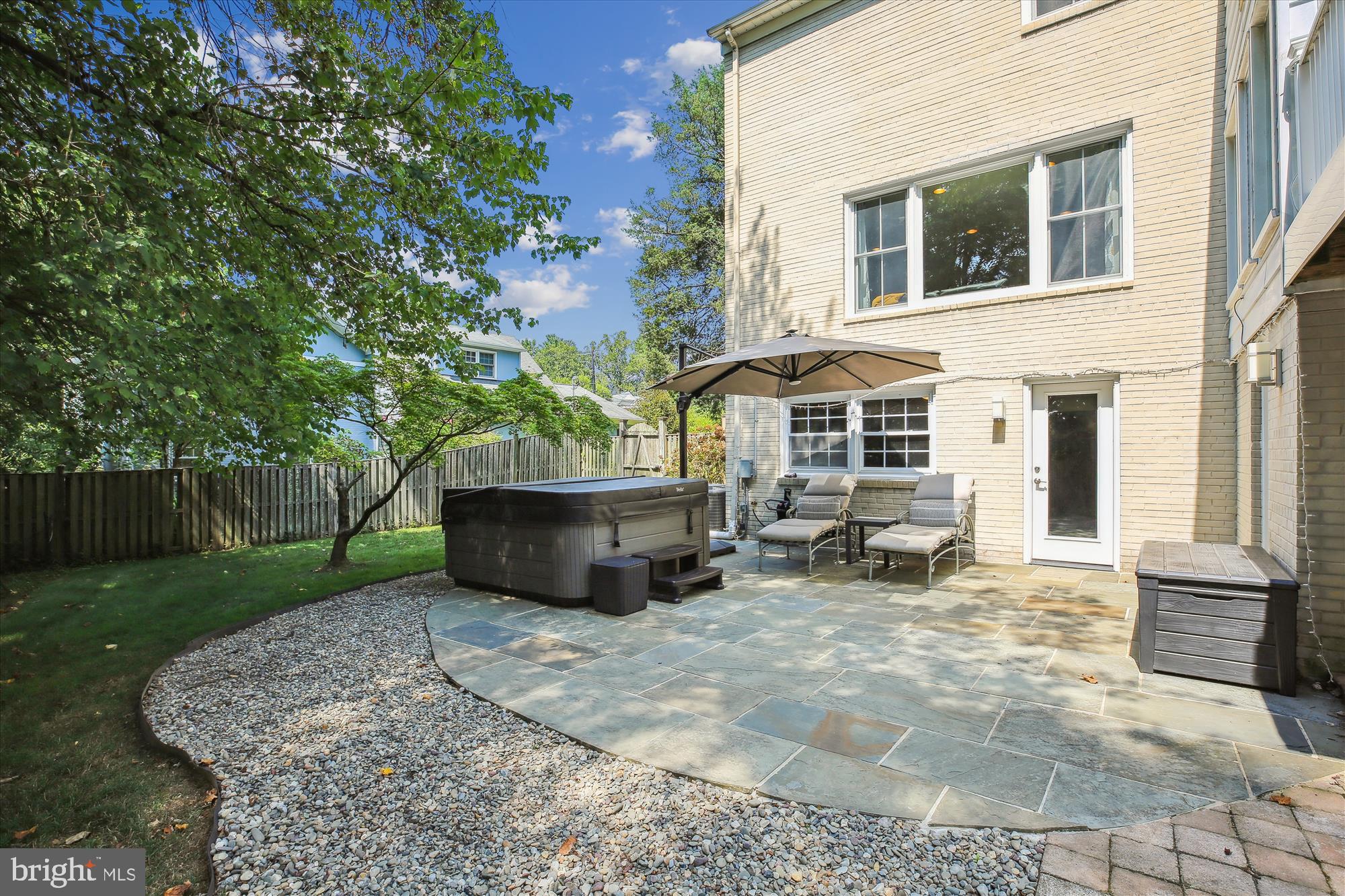 7304 Radnor Road Bethesda, MD 20817 - Photo 53 of 55 a view of a house with backyard and sitting area