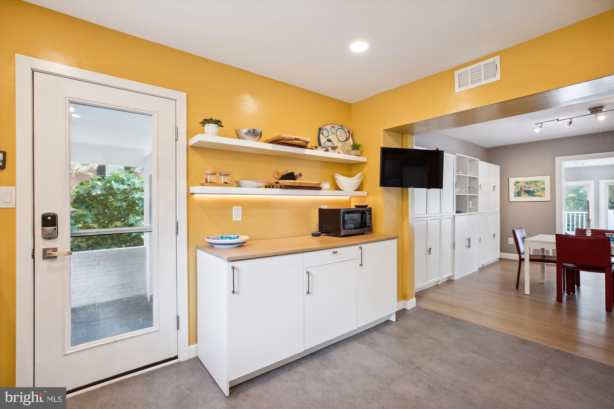 7304 Radnor Road Bethesda, MD 20817 - Photo 8 of 55 a kitchen with stainless steel appliances granite countertop a refrigerator and a stove top oven
