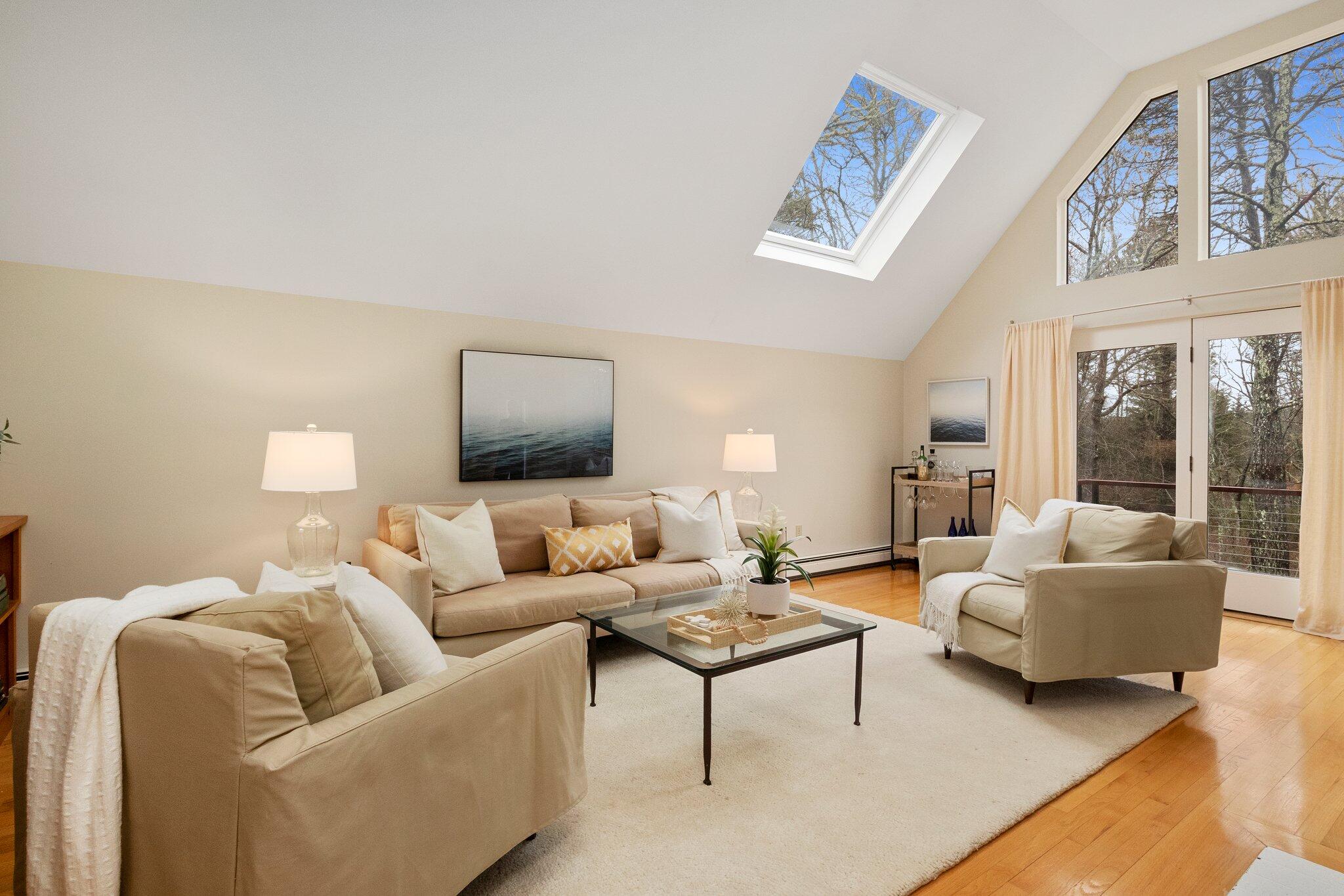 47 Babbling Brook Road Centerville, MA 02632 - Photo 8 of 36 a living room with furniture and a large window