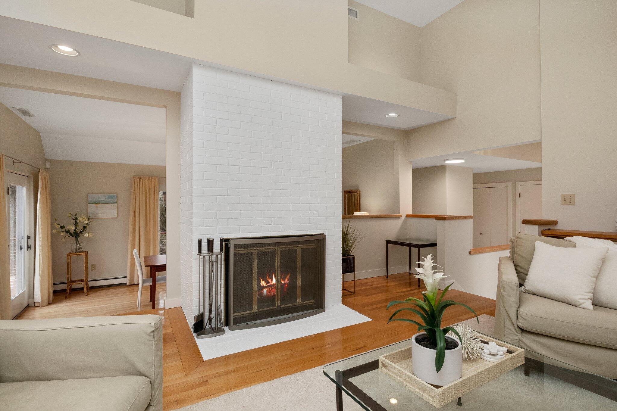 47 Babbling Brook Road Centerville, MA 02632 - Photo 10 of 36 a living room with furniture and a fireplace