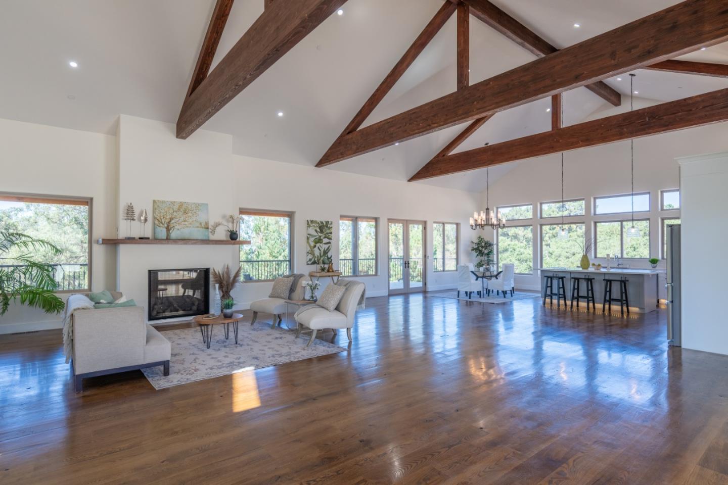 9020 Hidden Canyon Road Salinas, CA 93907 - Photo 14 of 58 a living room with fireplace furniture and a large window