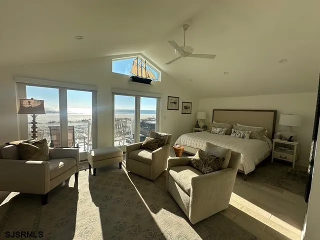 a bed room with a bed and a couch