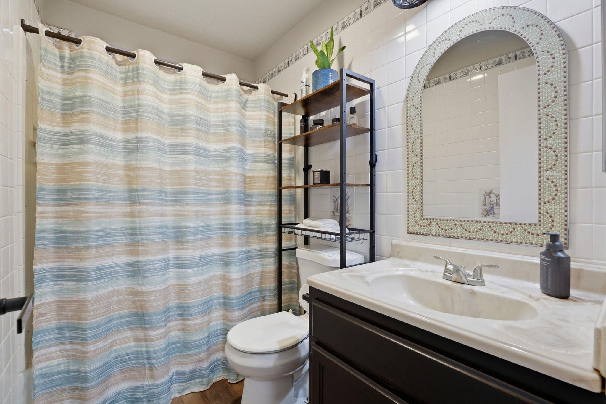 799 Morgans Ranch Circle Galt, CA 95632 - Photo 26 of 36 Bathroom with vanity and curtained shower