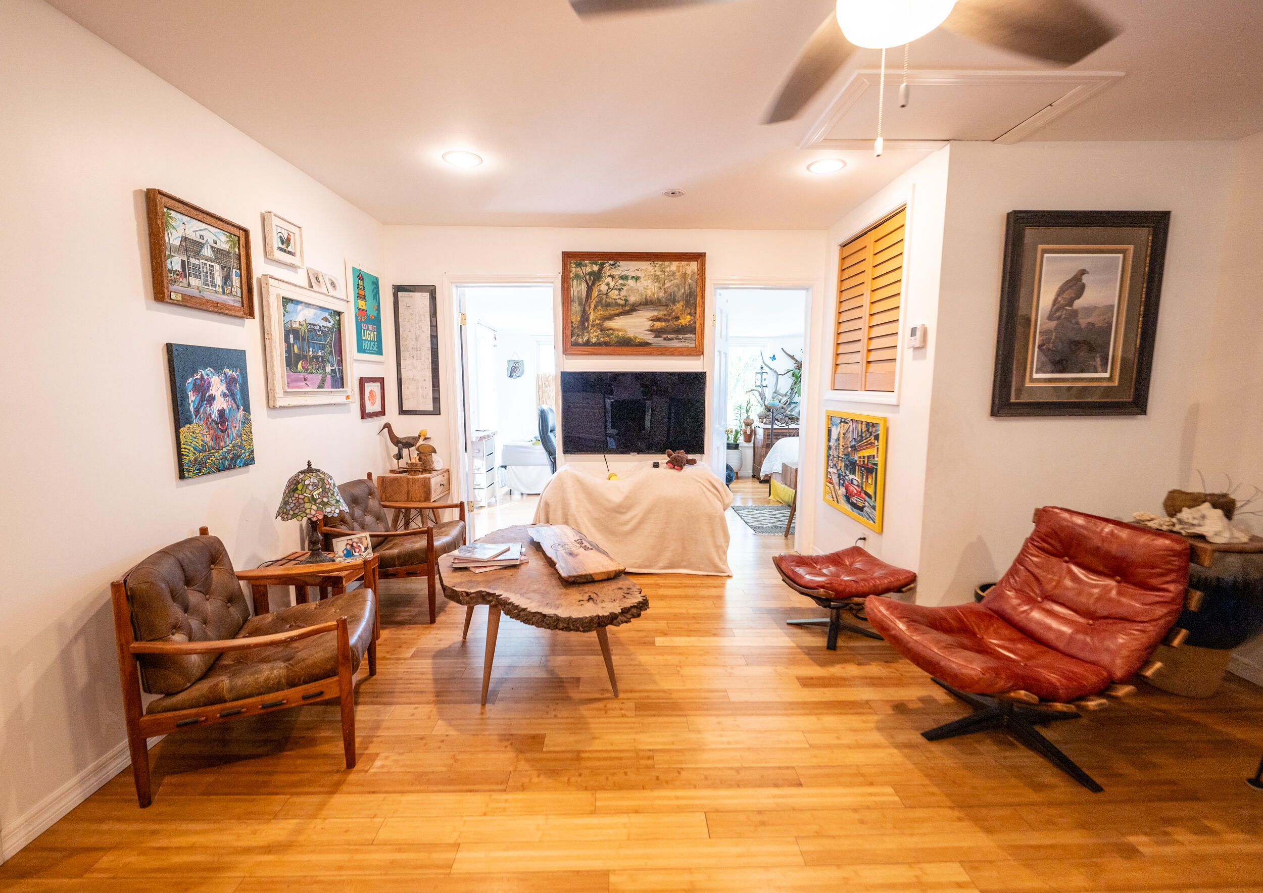 1124 Catherine Street, Unit 202 Key West, FL 33040 - Photo 12 of 22 a living room with furniture and a flat screen tv