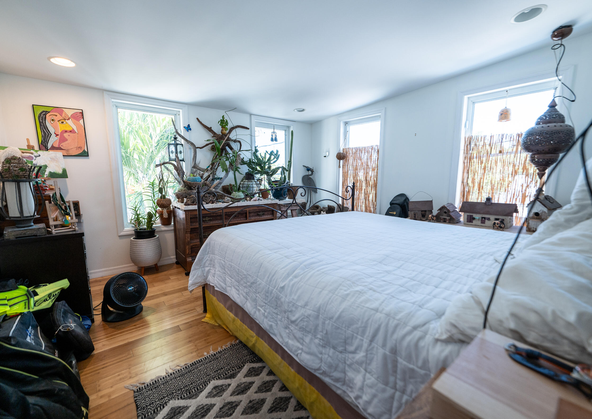 1124 Catherine Street, Unit 202 Key West, FL 33040 - Photo 13 of 22 a bedroom with a bed and a potted plant