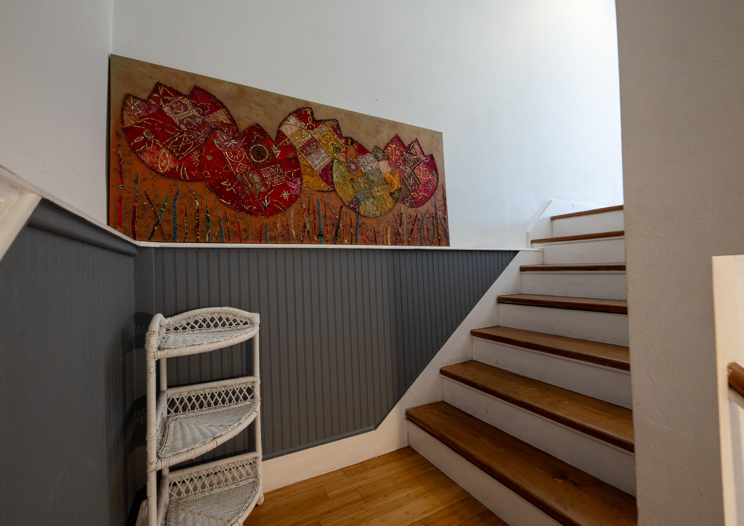 1124 Catherine Street, Unit 202 Key West, FL 33040 - Photo 18 of 22 a view of a room with stairs and a wooden floor