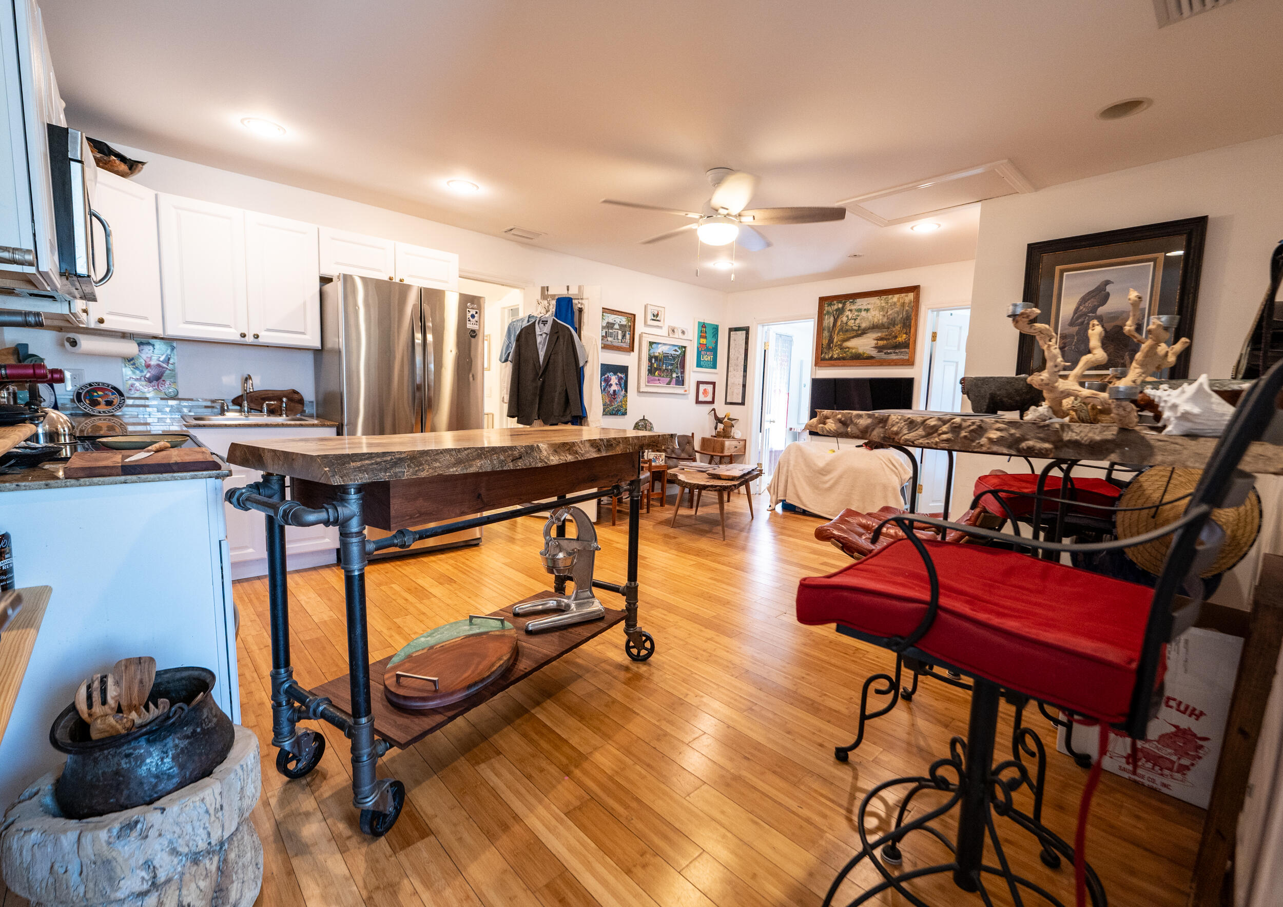 1124 Catherine Street, Unit 202 Key West, FL 33040 - Photo 8 of 22 a living room with furniture a flat screen tv and a sink