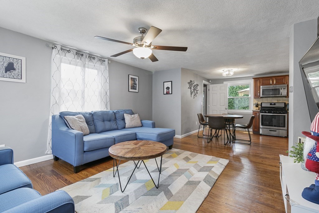 91 Aspen Road Springfield, MA 01128 - Photo 3 of 27 a living room with furniture wooden floor and window