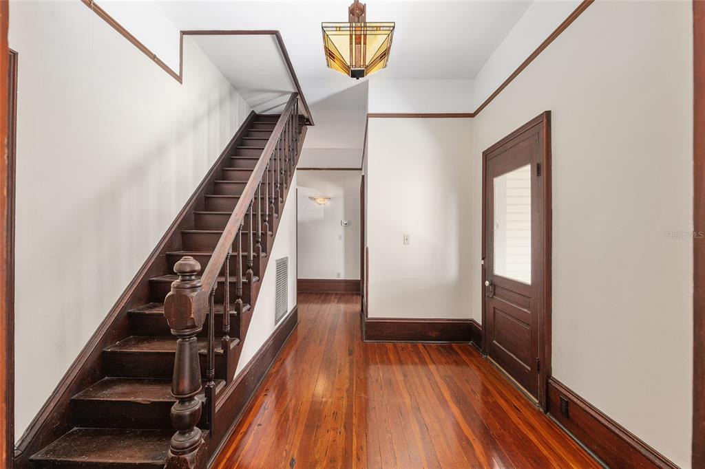 306 Northeast 3rd Street Gainesville, FL 32601 - Photo 54 of 88 a view of entryway and hall with wooden floor