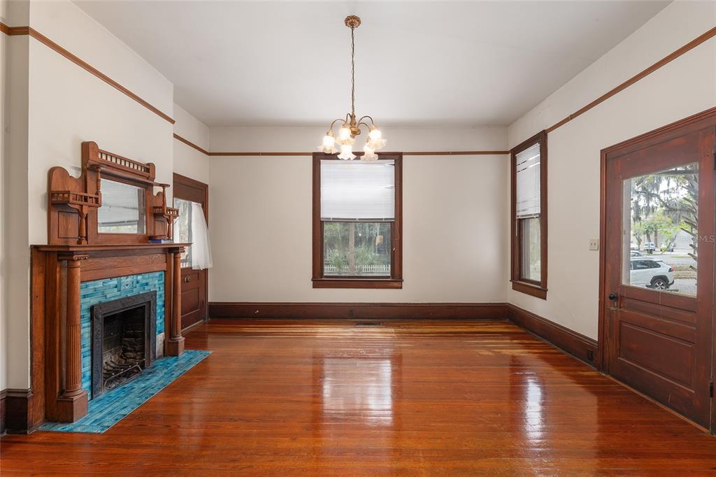 306 Northeast 3rd Street Gainesville, FL 32601 - Photo 57 of 88 a view of livingroom with window fireplace and hardwood floor