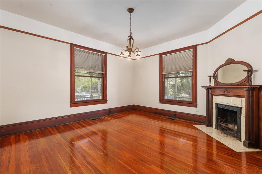 306 Northeast 3rd Street Gainesville, FL 32601 - Photo 65 of 88 a view of an empty room with window and fire place
