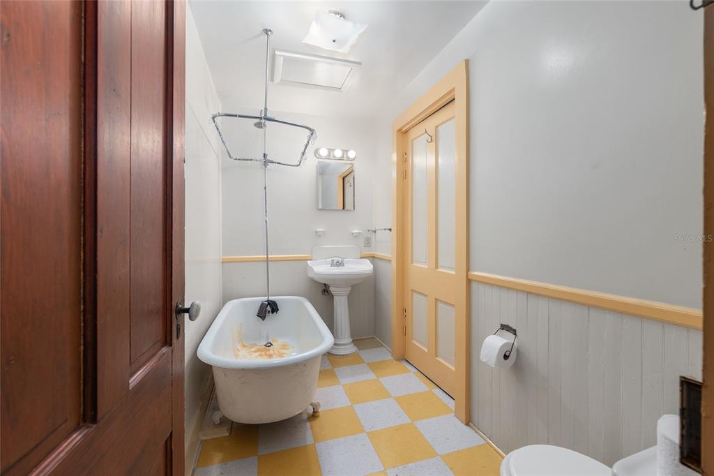 306 Northeast 3rd Street Gainesville, FL 32601 - Photo 72 of 88 a bathroom with a sink toilet and shower