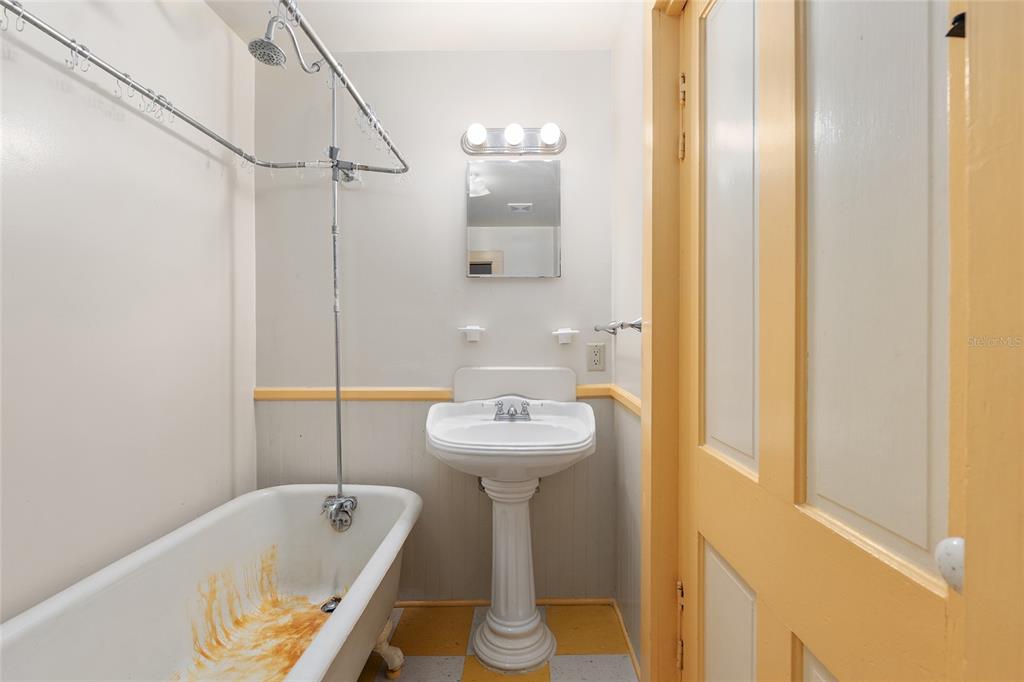 306 Northeast 3rd Street Gainesville, FL 32601 - Photo 73 of 88 a bathroom with a sink a toilet and shower