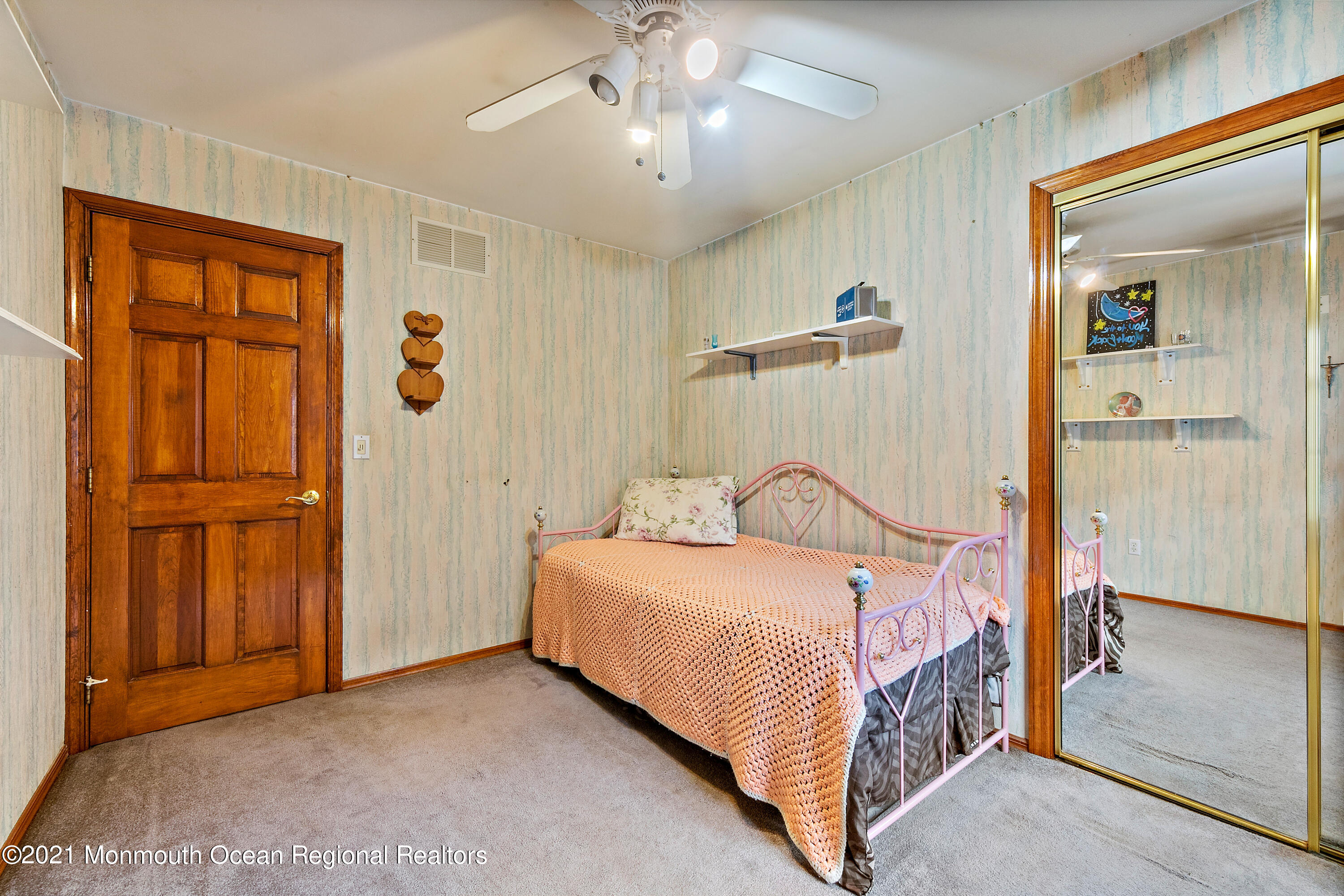 550 South Cooks Bridge Road Jackson, NJ 08527 - Photo 15 of 39 a bedroom with a bed and a table