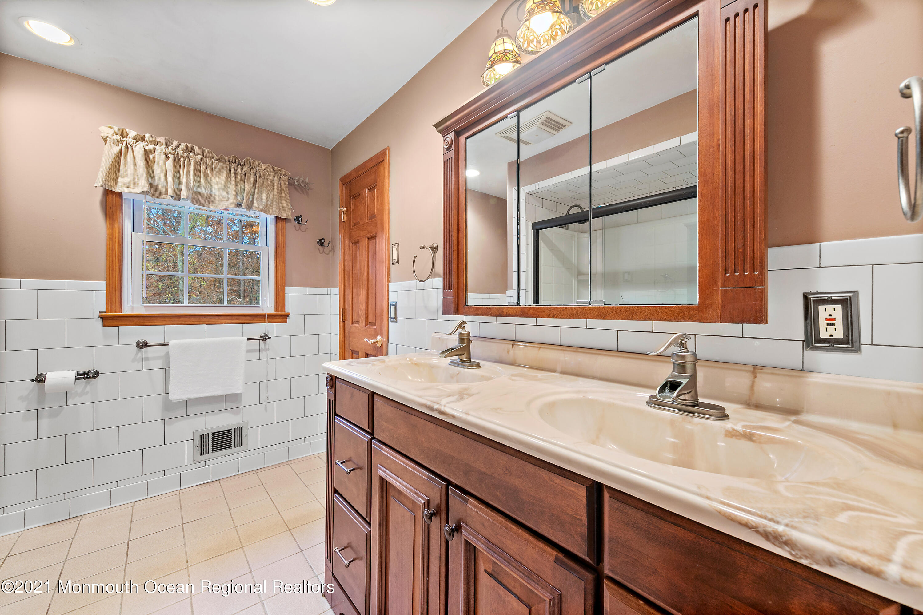 550 South Cooks Bridge Road Jackson, NJ 08527 - Photo 21 of 39 a bathroom with a sink and a mirror