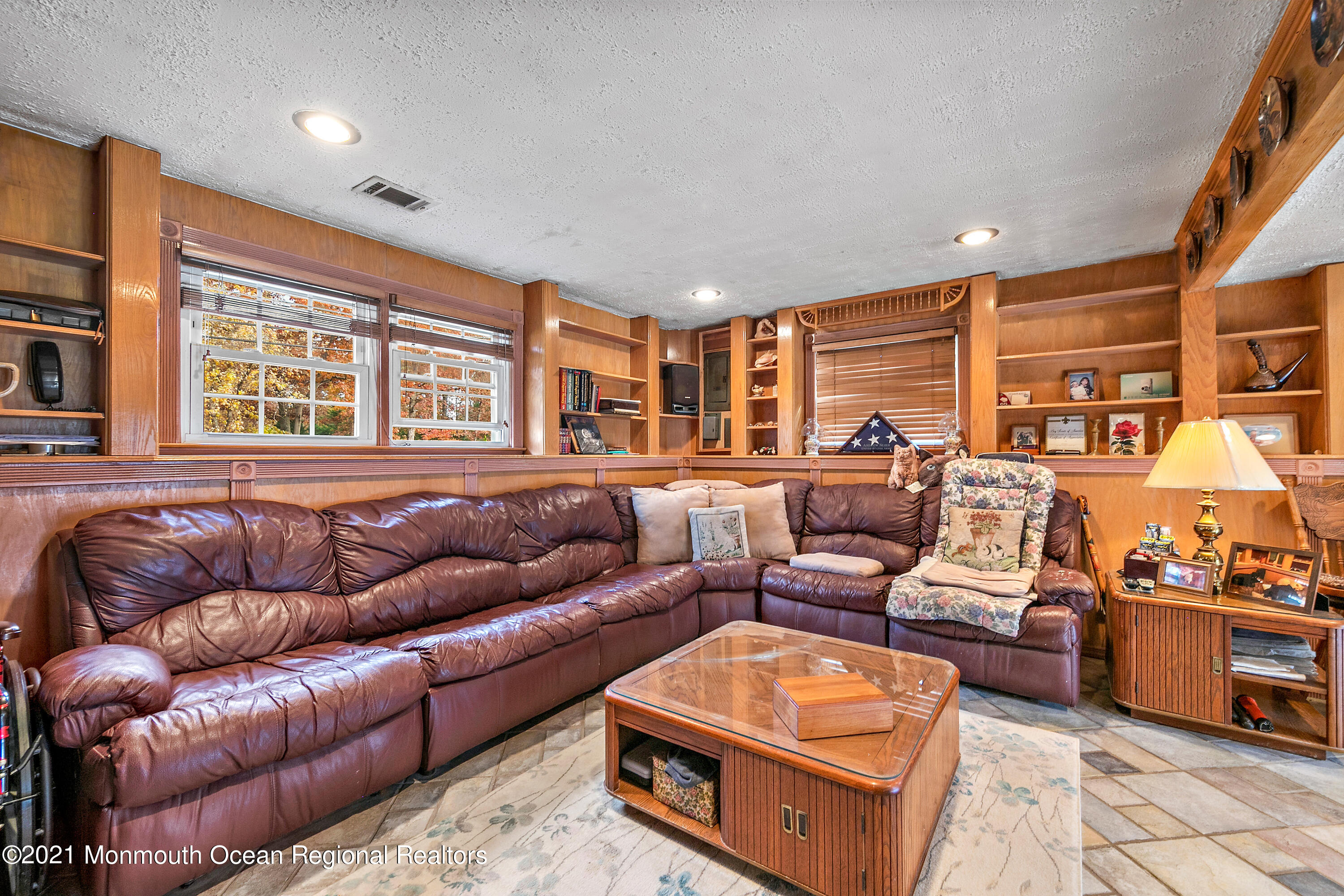 550 South Cooks Bridge Road Jackson, NJ 08527 - Photo 23 of 39 a living room with furniture ceiling fan and a large window