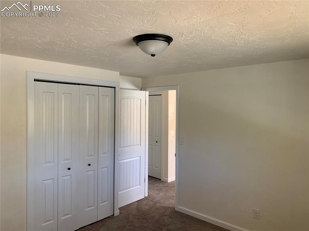1057 Peterson Road Colorado Springs, CO 80915 - Photo 13 of 32 Living Room