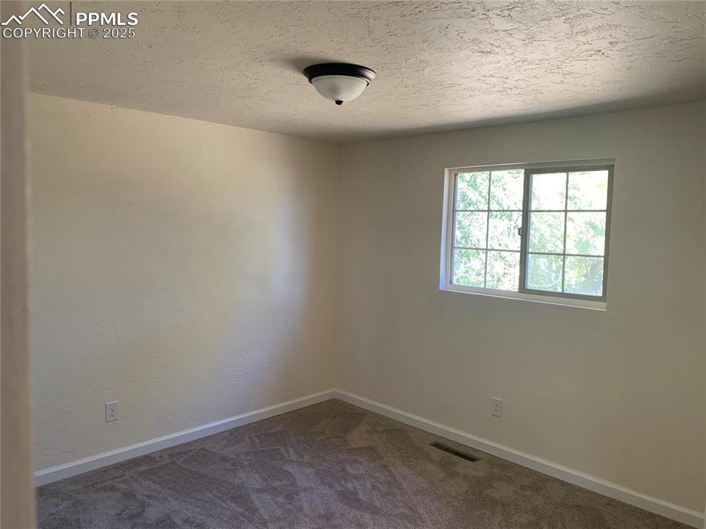 1057 Peterson Road Colorado Springs, CO 80915 - Photo 14 of 32 Living Room