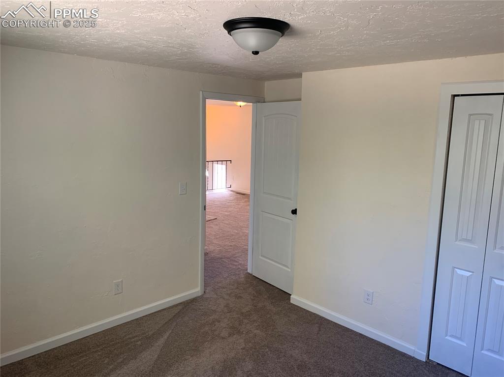 1057 Peterson Road Colorado Springs, CO 80915 - Photo 16 of 32 Primary Bedroom