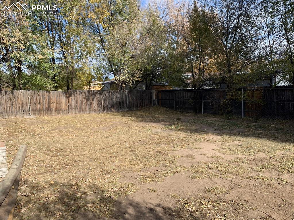 1057 Peterson Road Colorado Springs, CO 80915 - Photo 9 of 32 View of yard