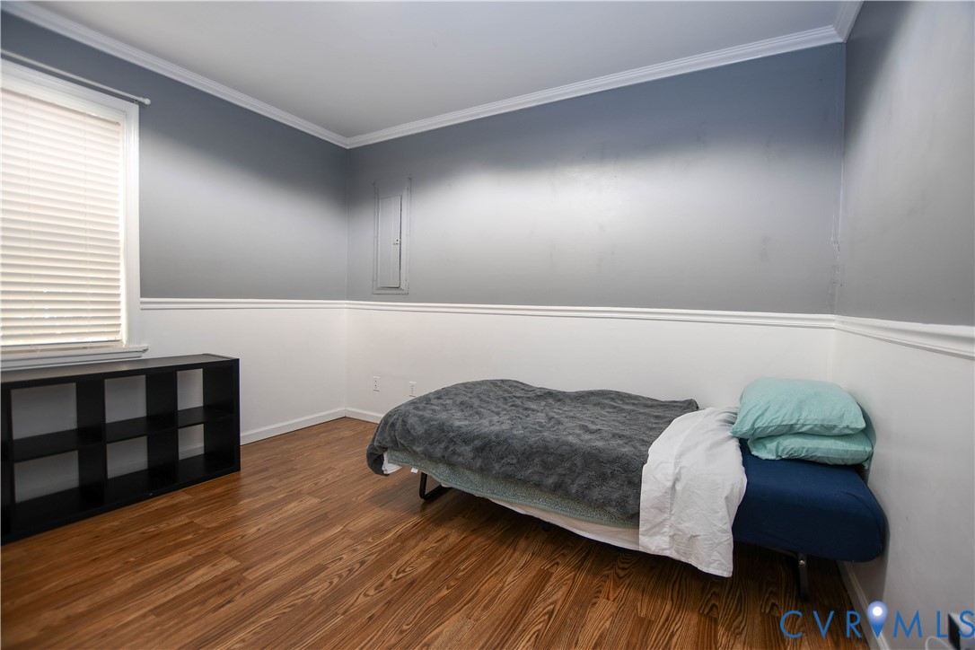 153 Deer Trail Aylett, VA 23009 - Photo 13 of 50 a living room with a bed and a dresser