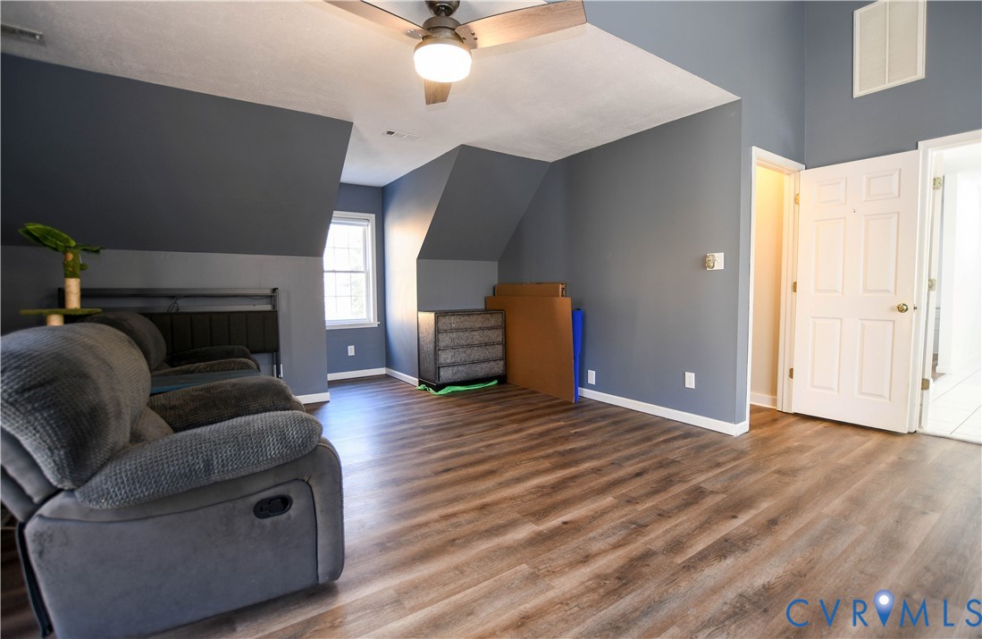 153 Deer Trail Aylett, VA 23009 - Photo 16 of 50 a living room with furniture and a fireplace