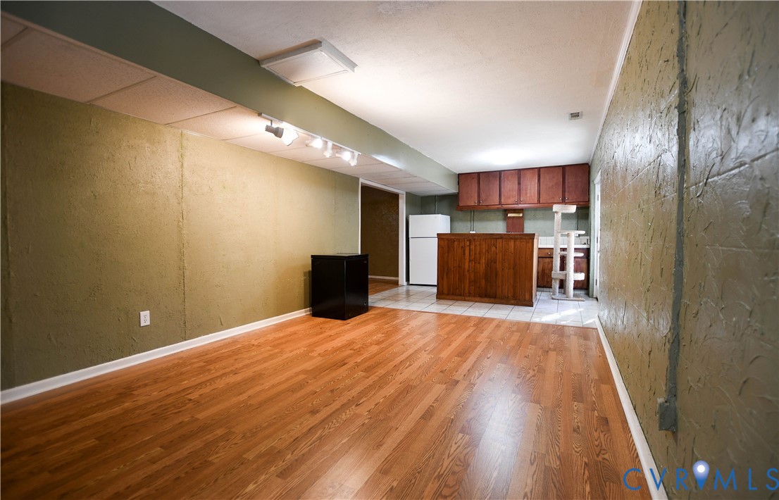 153 Deer Trail Aylett, VA 23009 - Photo 26 of 50 a view of a kitchen with a sink and a refrigerator