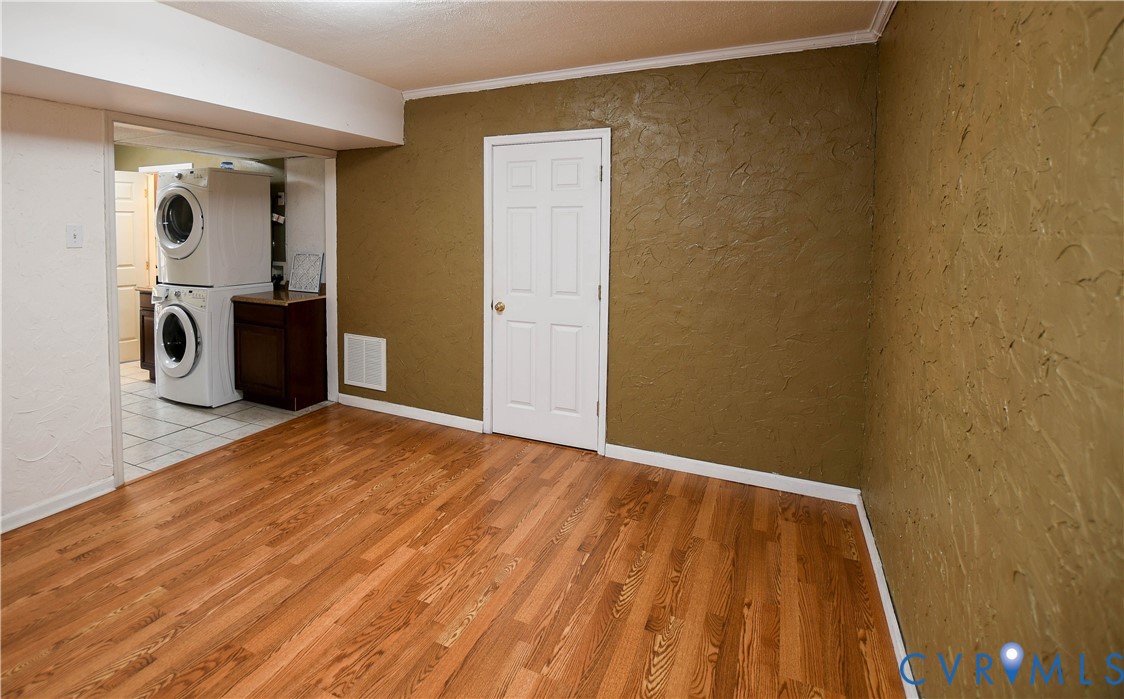 153 Deer Trail Aylett, VA 23009 - Photo 28 of 50 Laundry room featuring a textured wall, light wood