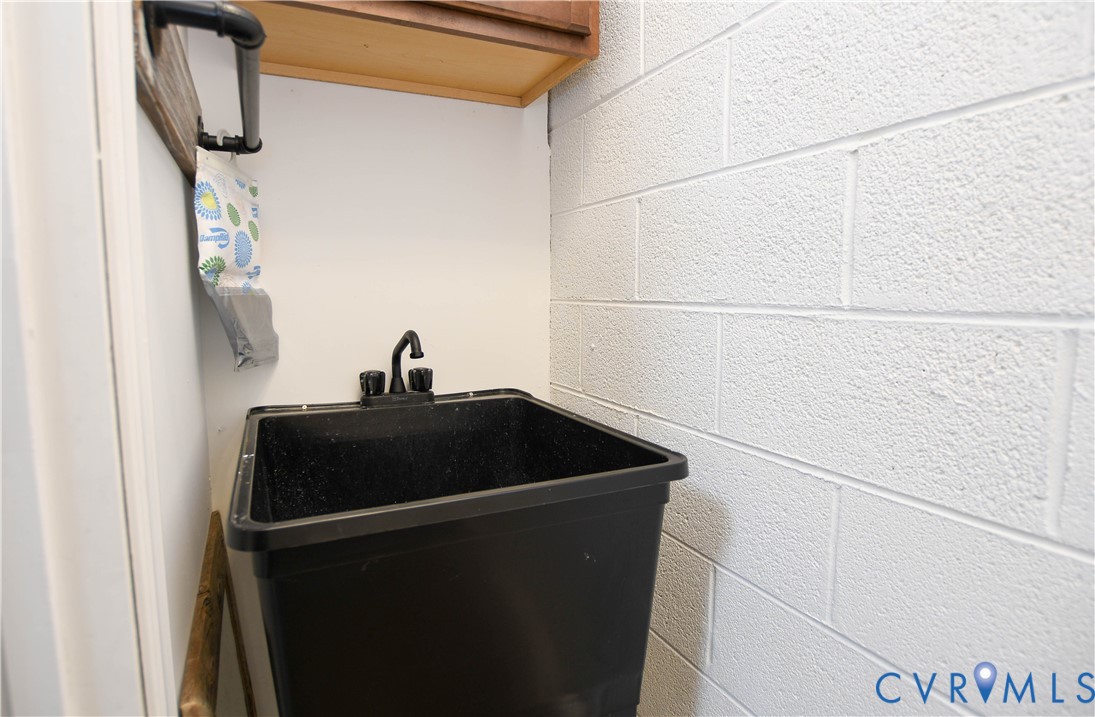 153 Deer Trail Aylett, VA 23009 - Photo 30 of 50 a close view of a sink and dishwasher in a refrigerator