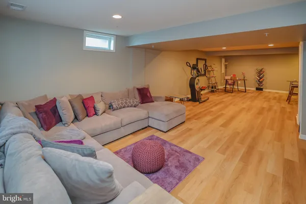 a living room with furniture and a couch